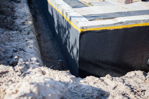 Professional Exterior Waterproofing technician working in Flat Rock, MI